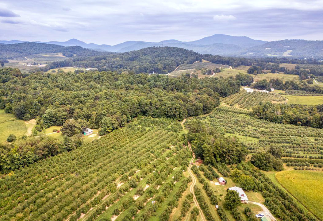 Aerial view of the Blue Ridge Mountains and rolling orchard hills near Asheville, NC Aerial view of the Blue Ridge Mountains and rolling orchard hills near Asheville, NC