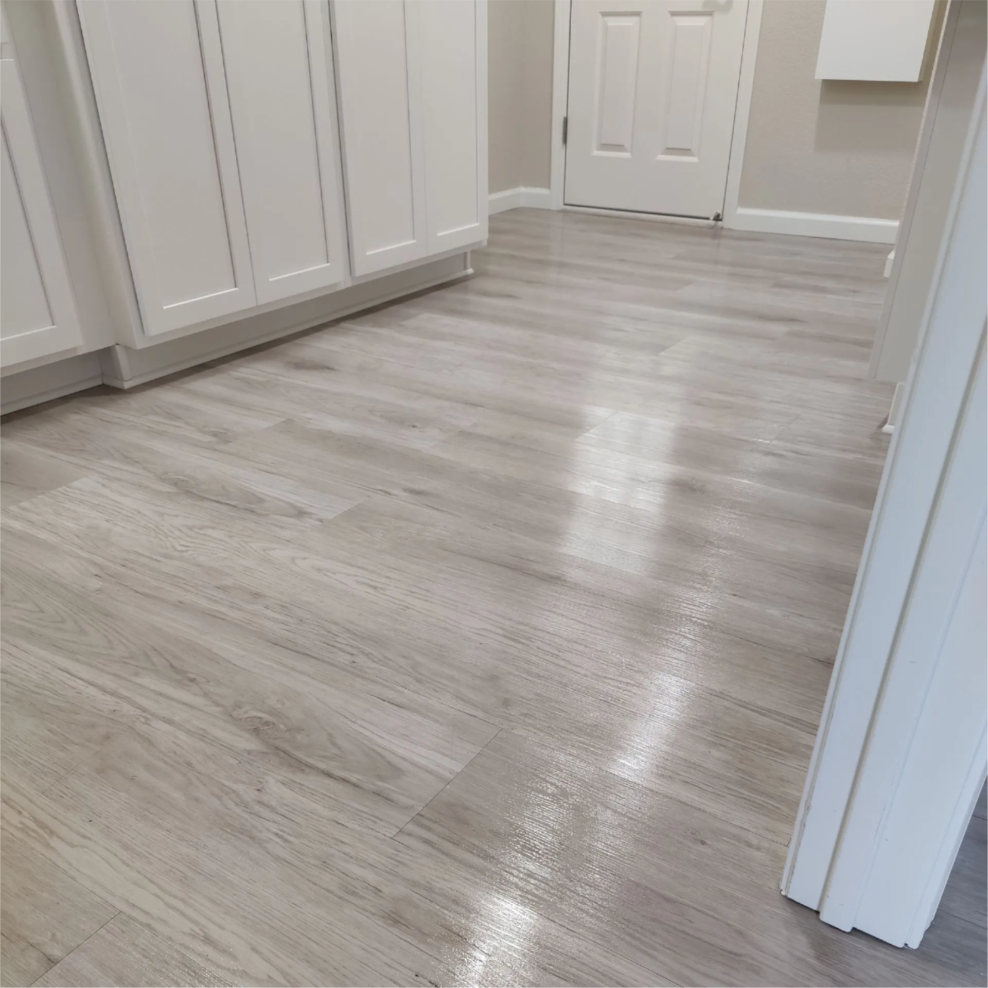 Office space with cubicles on a clean, polished tile floor Office space with cubicles on a clean, polished tile floor