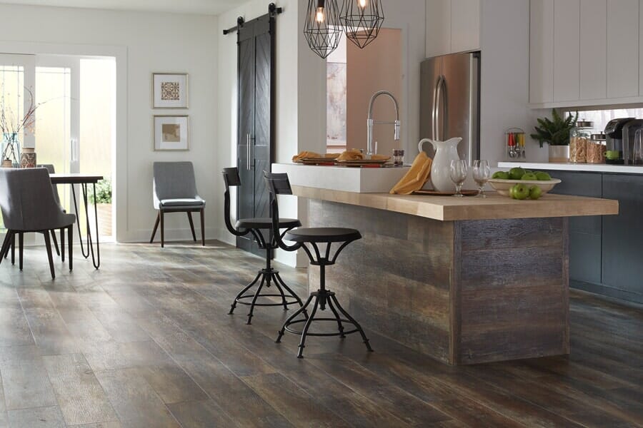 a kitchen with a wood floor and a wood floor a kitchen with a wood floor and a wood floor