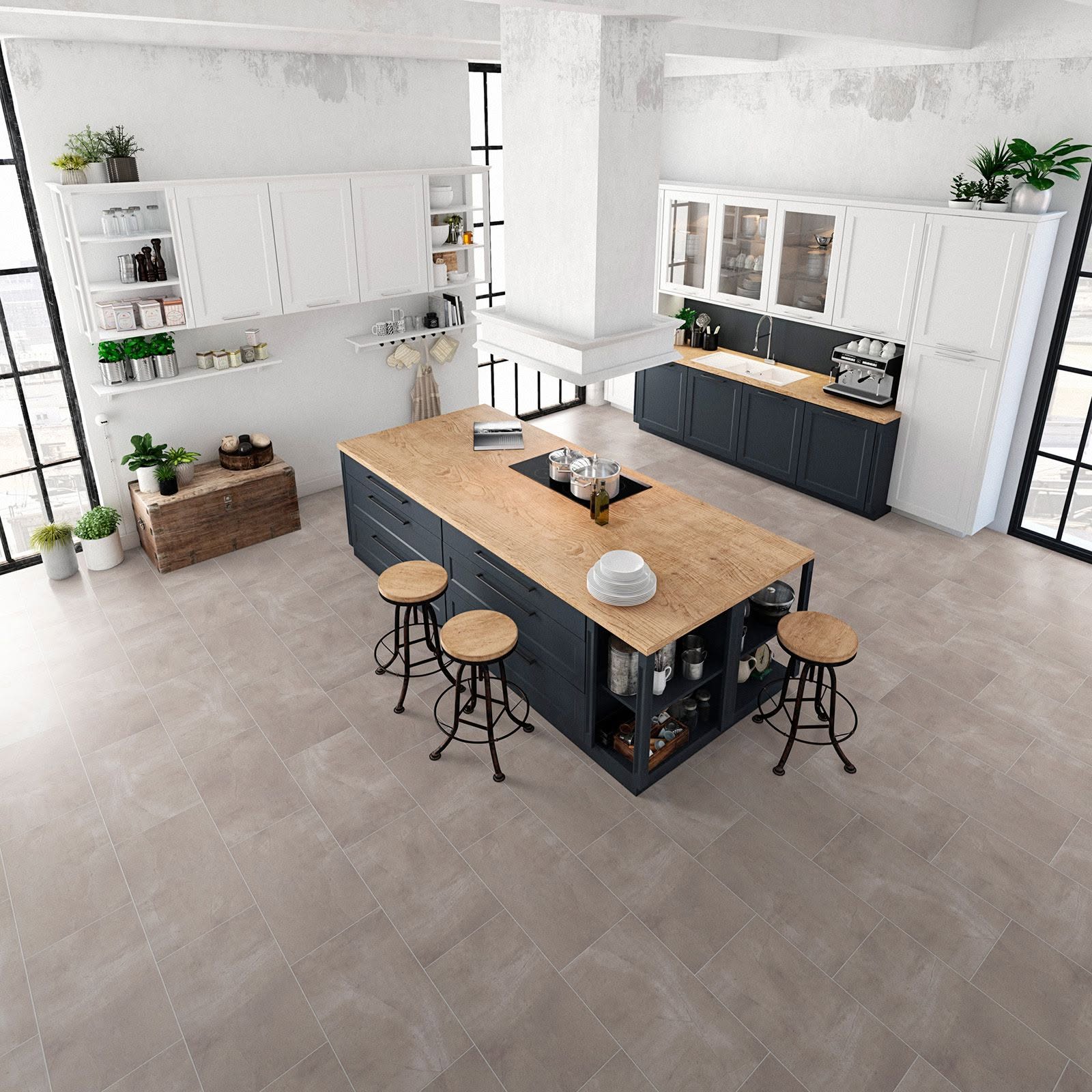 a kitchen with a large island and stools