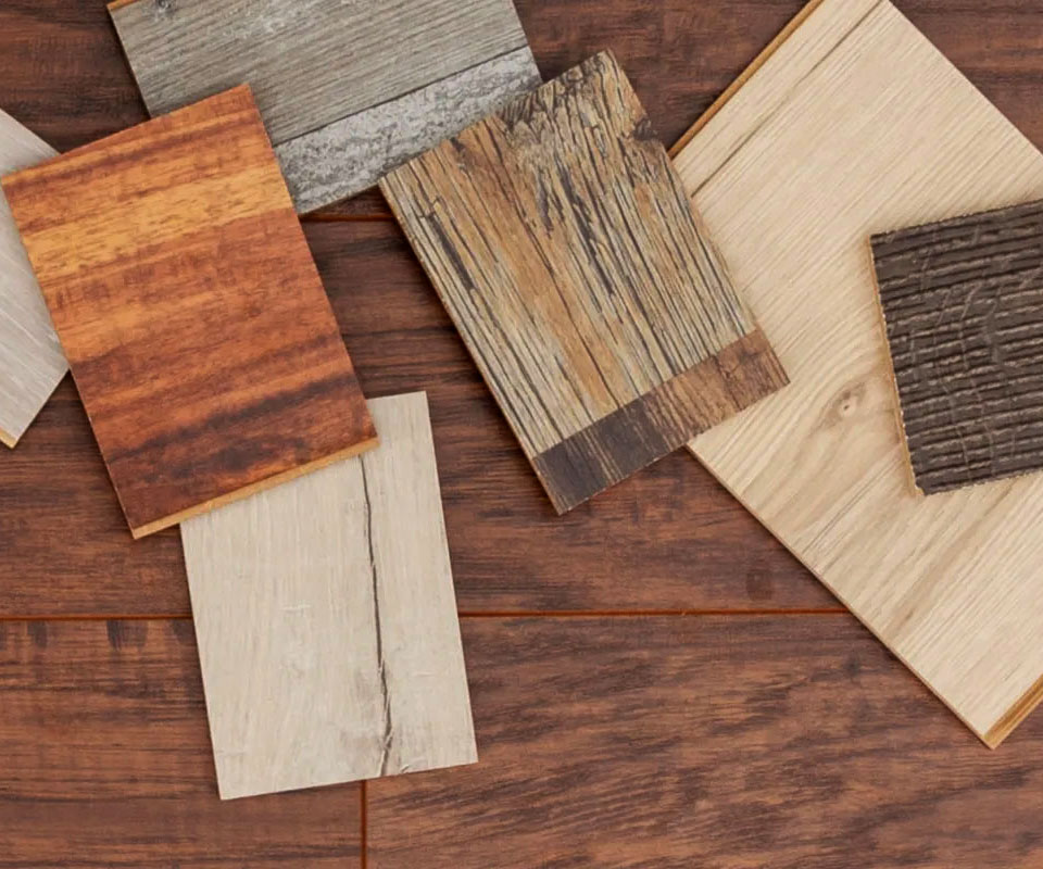 a group of wood samples on a wood floor a group of wood samples on a wood floor
