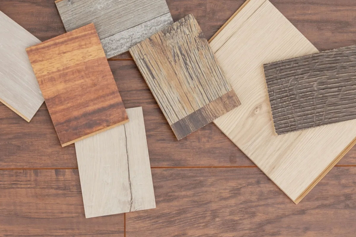 a group of wood samples on a wood floor a group of wood samples on a wood floor