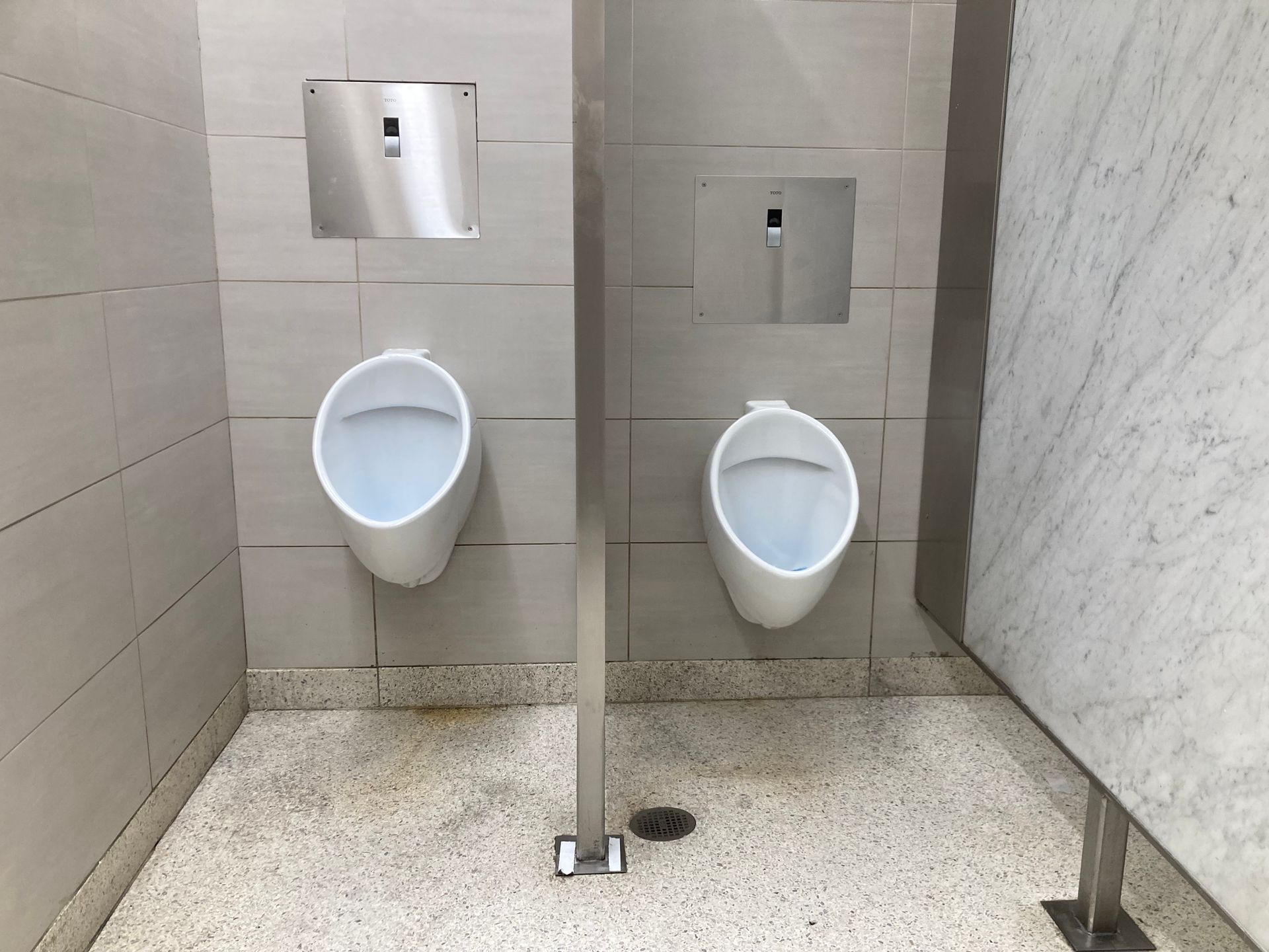a urinals in a bathroom