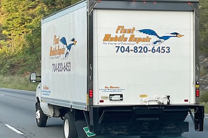 a white truck on the road