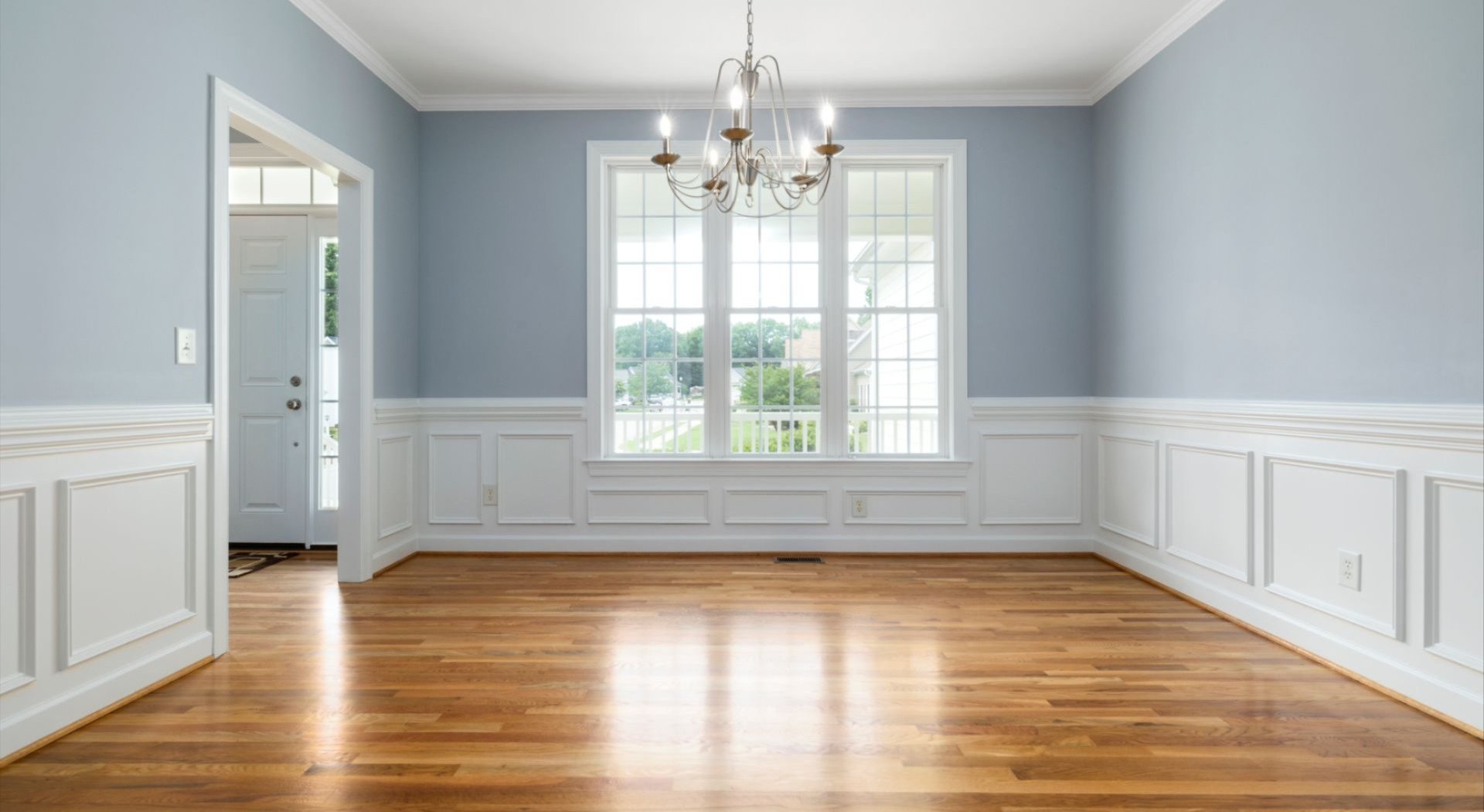 Hardwood Floor in an empty dining room with shine and bright colors Hardwood Floor in an empty dining room with shine and bright colors